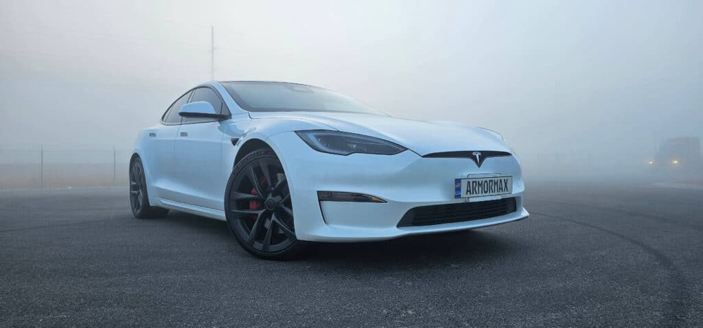 White Bulletproof Tesla Armormax bulletproof vehicle maintaining factory performance and comfort.